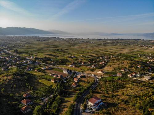 an aerial view of a small village in a field at Joni Restaurant in Pogradec