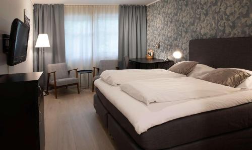 Lova arba lovos apgyvendinimo įstaigoje Best Western Tingvold Park Hotel