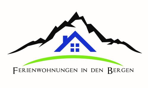 a mountain and a house in the middle of a valley at Ferienwohnung Marktstüberl in Mittenwald