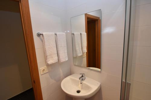 Koupelna v ubytování INMOMILCASAS APARTAMENTOS