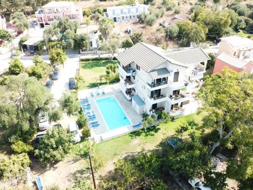 an aerial view of a house with a swimming pool at Villa Apollo in Parga