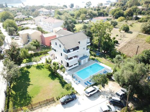 an aerial view of a house with a swimming pool at Villa Apollo in Parga