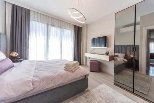 Katil atau katil-katil dalam bilik di Green Hills Suites
