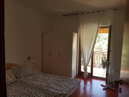 Postel nebo postele na pokoji v ubytování Grebaville Apartment