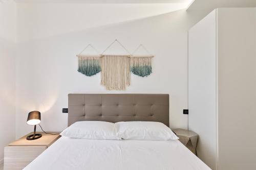 A bed or beds in a room at CASA AGATA