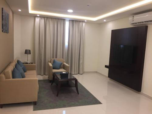 Χώρος καθιστικού στο Arif Serviced Apartments