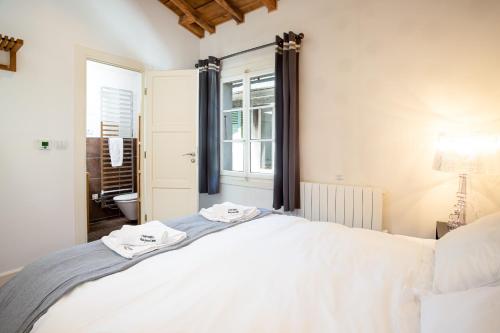 Ένα ή περισσότερα κρεβάτια σε δωμάτιο στο Penthouse le Bartavel - Chamonix All Year