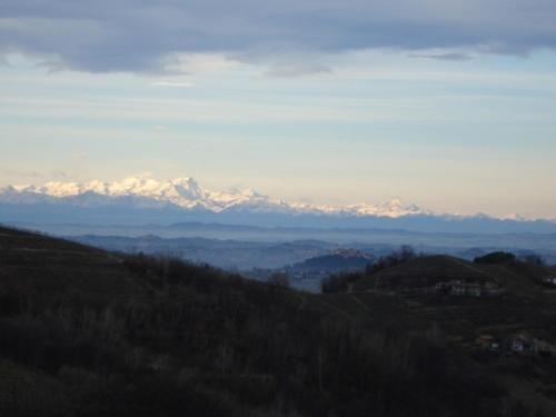 a view of snow capped mountains in the distance at Casa Calendula in Cassinasco
