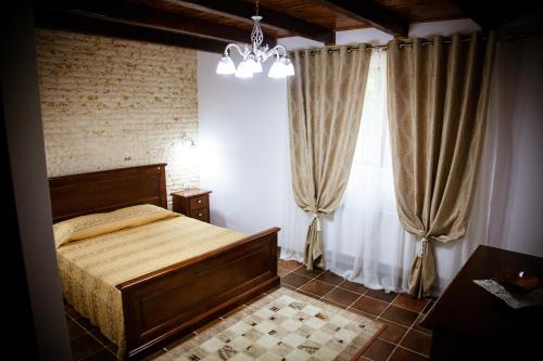 Postel nebo postele na pokoji v ubytování Casa Poenita