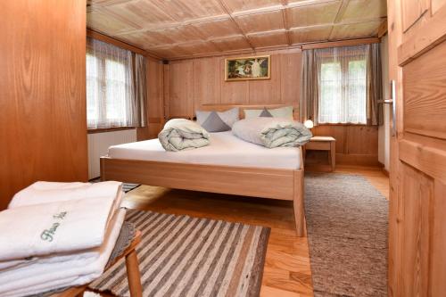 מיטה או מיטות בחדר ב-Haus Ida