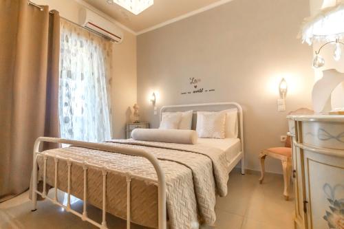 Säng eller sängar i ett rum på Casa D'Oro Exclusive Villa
