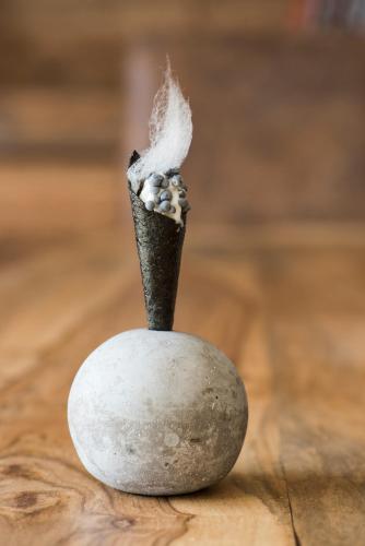 a small rock with a piece of smoke coming out of it at Terra - The Magic Place Relais & Châteaux in Sarntal