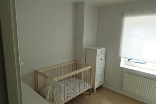 Postel nebo postele na pokoji v ubytování Kuressaare Park Apartment