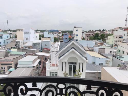 - Balcón con vistas a la ciudad en Nhà Nghỉ Sugar, en Can Tho