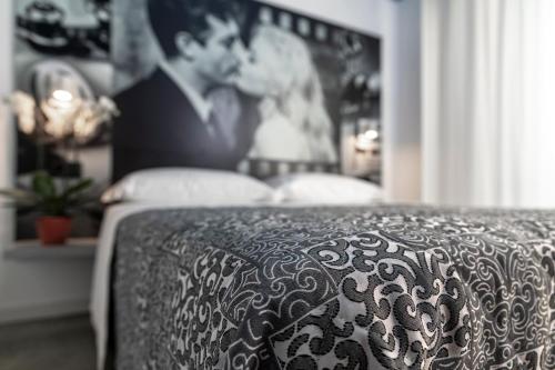 Postel nebo postele na pokoji v ubytování Residence Filmare