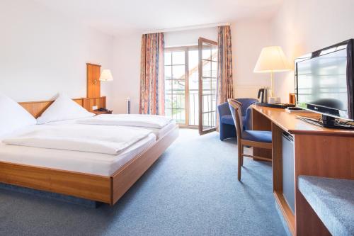 Postel nebo postele na pokoji v ubytování Hotel Blume