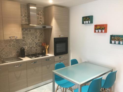 Η κουζίνα ή μικρή κουζίνα στο Porto di mare luxury home