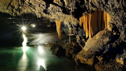 a cave with a river inside of it at Chalupa Liptovský Mikuláš in Liptovský Mikuláš