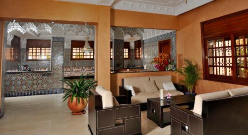 a living room with a couch and a table at LHOSTEL à Casablanca in Casablanca