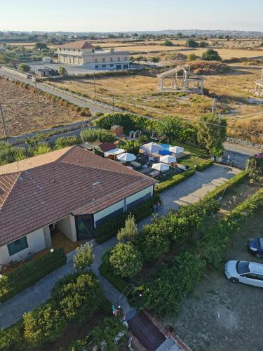 an overhead view of a building with a parking lot at Villa Rosa in Modica
