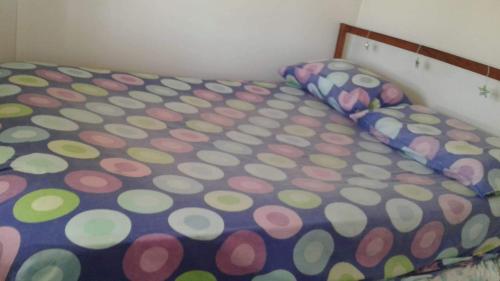 Postel nebo postele na pokoji v ubytování Hostal Posada Del Hum