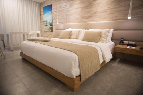 Кровать или кровати в номере Oro Verde Manta