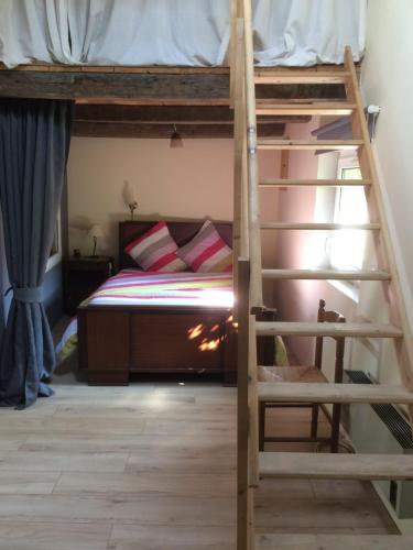 Postel nebo postele na pokoji v ubytování chez la Berthe Colmé