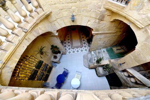 an overhead view of a building with two arches at The Lodge in Cospicua