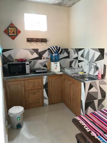a kitchen with a sink and a counter top at Los Lapachos in Altos