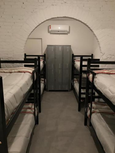 Cama o camas de una habitación en Imagina Hostel