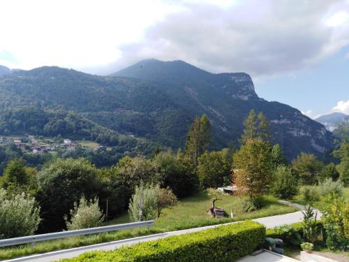 a view of a mountain range with a road at Bed and Breakfast Ai Sassi in Sovramonte