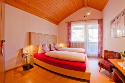 Postel nebo postele na pokoji v ubytování Guesthouse Christine