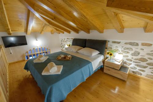 Ένα ή περισσότερα κρεβάτια σε δωμάτιο στο Guarda il porto