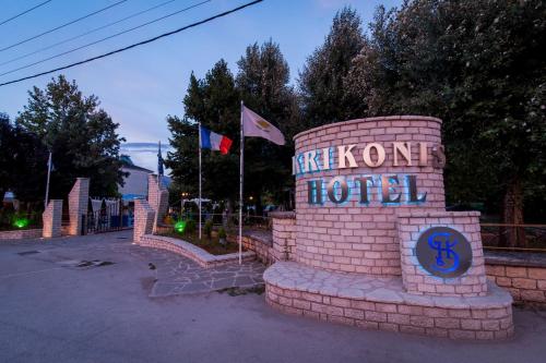 a sign that says make a us hotel with flags at Krikonis Hotel in Ioannina
