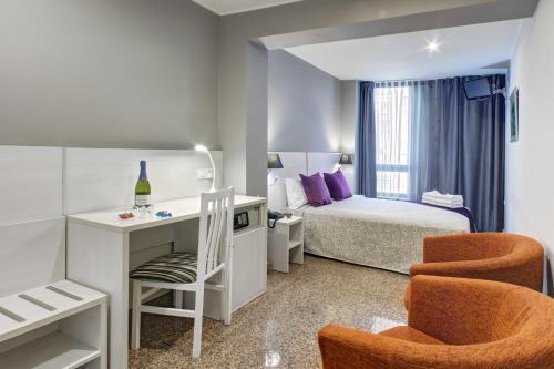 A seating area at Hotel Nuevo Triunfo