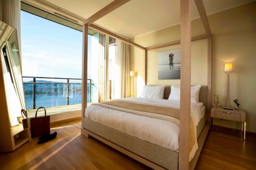 Katil atau katil-katil dalam bilik di Kragerø Resort