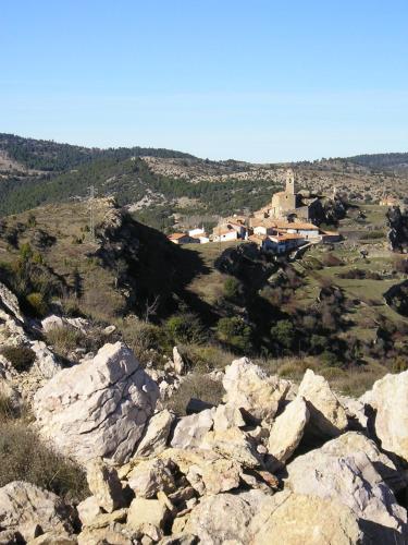 a view from the top of a mountain with rocks at Casa La Mestra in Herbeset