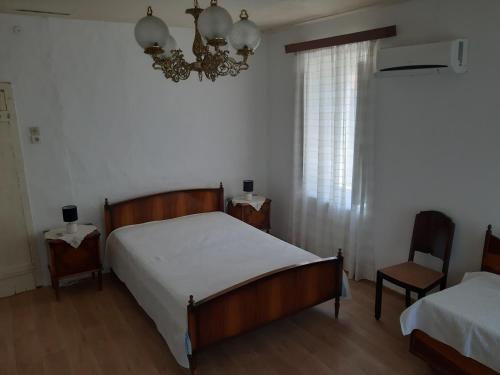 Ένα ή περισσότερα κρεβάτια σε δωμάτιο στο Villa Avli