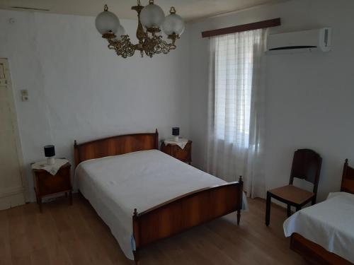 Postel nebo postele na pokoji v ubytování Villa Avli