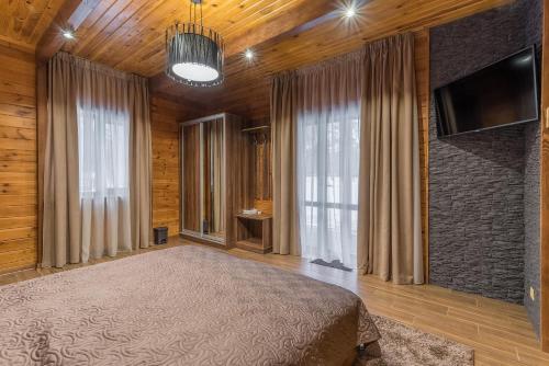 Ένα ή περισσότερα κρεβάτια σε δωμάτιο στο Hotel Selena Family Resort