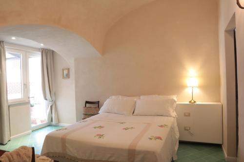 Ένα ή περισσότερα κρεβάτια σε δωμάτιο στο Masseria Torca - Isca