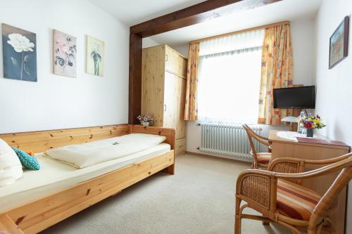 Ένα ή περισσότερα κρεβάτια σε δωμάτιο στο Hotel Silberdistel