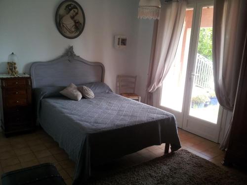 Ein Bett oder Betten in einem Zimmer der Unterkunft Villa Via serena