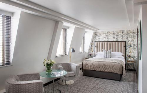 En eller flere senge i et værelse på The Marylebone Hotel