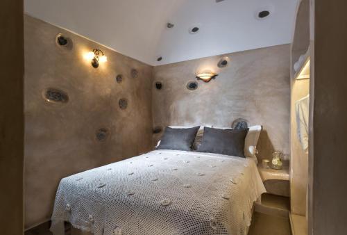 Säng eller sängar i ett rum på Hariton villas