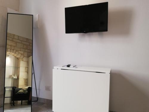 TV a/nebo společenská místnost v ubytování Triskelion