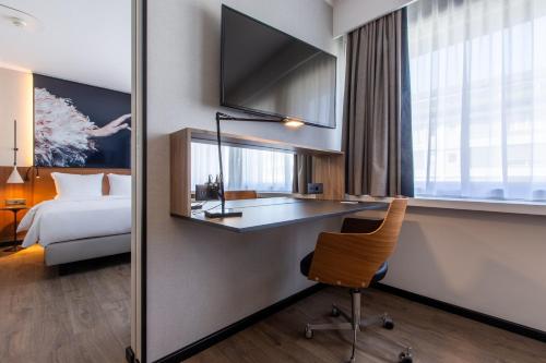 Cama o camas de una habitación en Radisson Blu, Basel