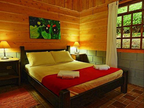 Postel nebo postele na pokoji v ubytování Rancho Amalia