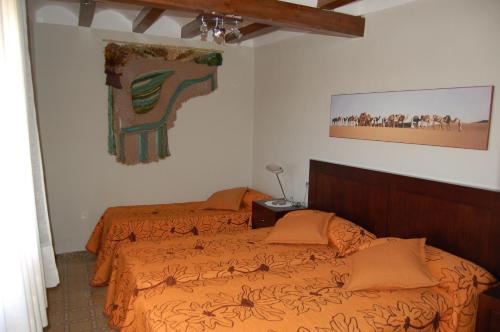 Cama o camas de una habitación en Cal Canya