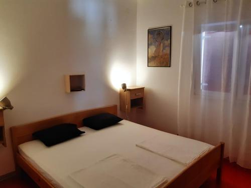 Posteľ alebo postele v izbe v ubytovaní Villa Romantica
